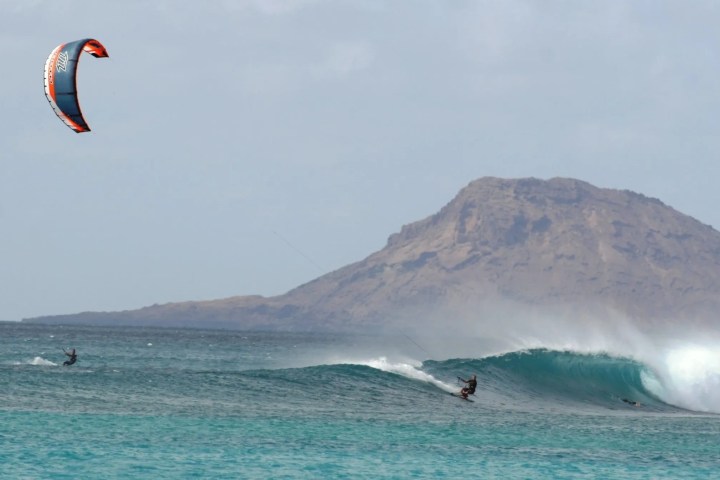 people kite surfing in the ocean