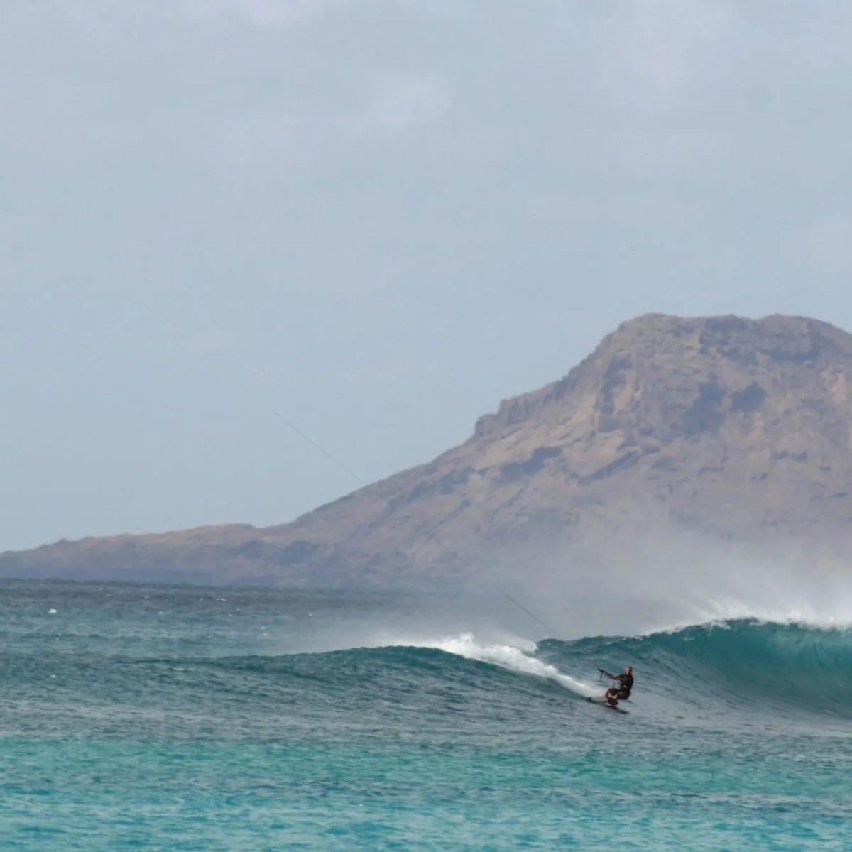 people kite surfing in the ocean