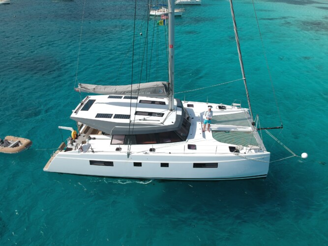 a boat is docked next to a body of water